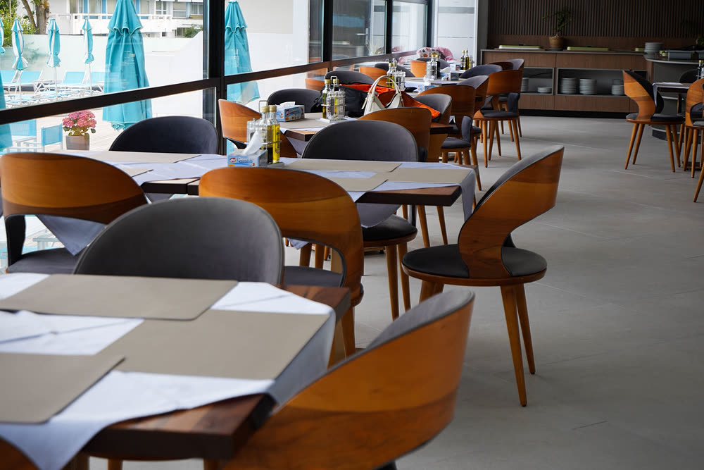 Tables laid in the restaurant dining room