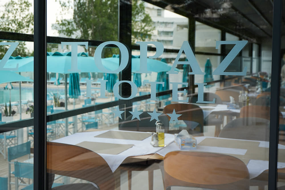 Restaurant interior with blue chairs